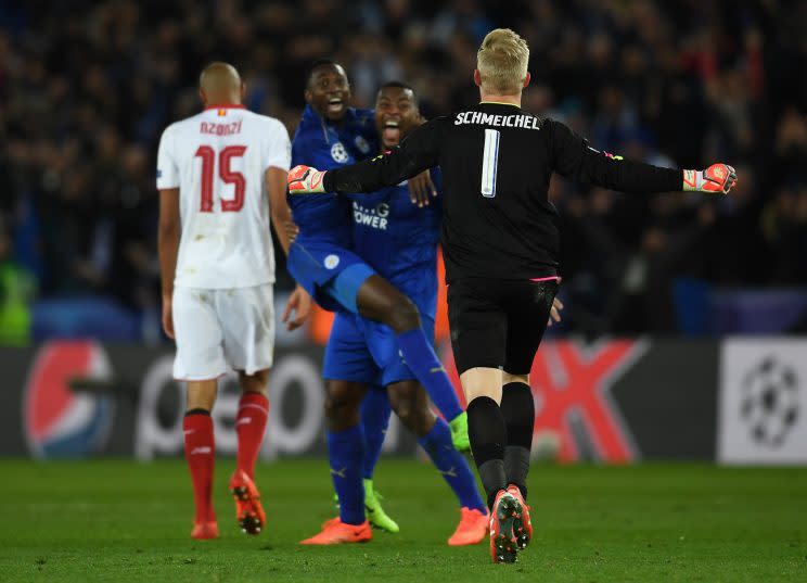 Hero again, Kasper Schmeichel celebrates with team mates