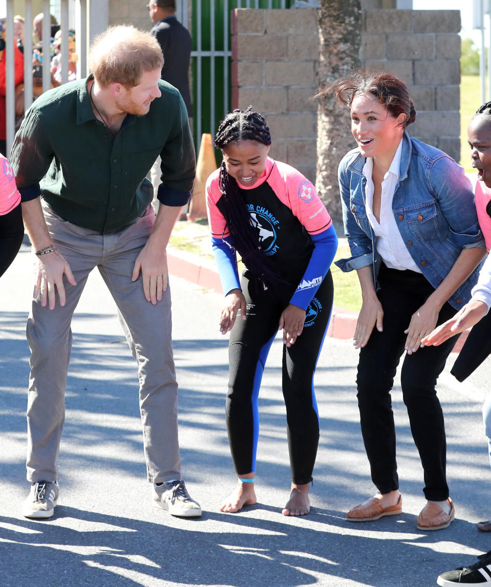 Prince Harry looked stylish as he paired his smart casj look with a pair of Adidas Gazelles [Photo: Getty Images]