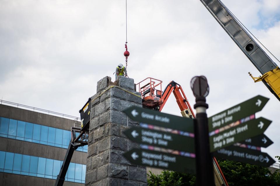 The deconstruction of Vance Monument continues on Tuesday, May 25, 2021 - one year after the death of George Floyd.