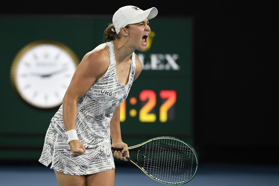 Ash Barty of Australia celebrates after defeating Danielle Collins of the U.S., in the women's singles final at the Australian Open tennis championships in Saturday, Jan. 29, 2022, in Melbourne, Australia. (AP Photo/Andy Brownbill)