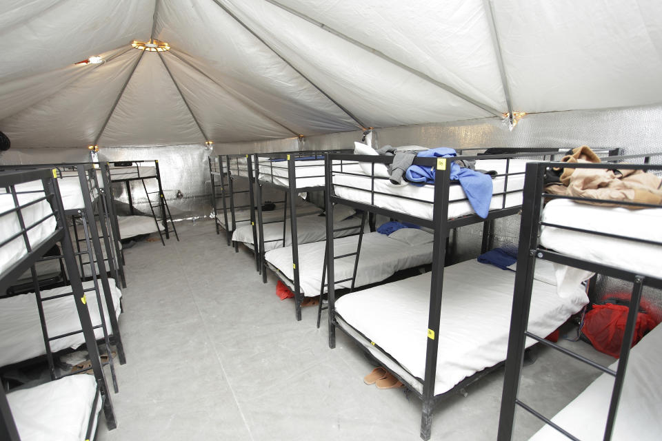 FILE - This undated photo released by U.S. Department of Health and Human Services shows inside of the HHS' facility at Tornillo, Texas. On Friday, June 28, 2019, border officials were expected to unveil the newest outdoor facility meant to detain immigrant children and families who cross the U.S. border near Yuma, Ariz. Over the last two years, that area has seen a tremendous spike in the number of families and children who travel unaccompanied. (U.S. Department of Health and Human Services via AP, File)