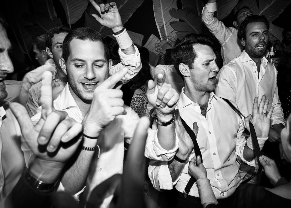 The boys in the zone, using suspenders as party accessories.