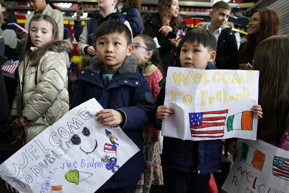 Children of embassy staff wait to greet President Joe Biden steps at Dublin International Airport in Dublin, Ireland, Wednesday, April 12, 2023. (AP Photo/Patrick Semansky)