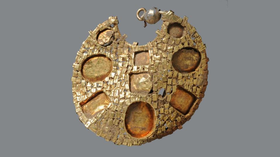 The back of one gold earring in the Byzantine style.