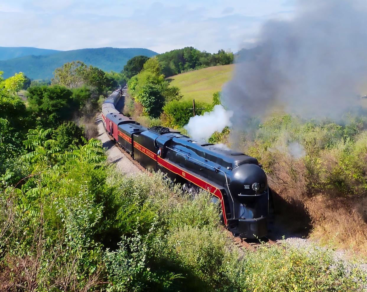 Just passing Swoope, Norfolk and Western steam locomotives 611 pulls its excursion cars from Goshen to Stauton and returns during the bright fall weekends.