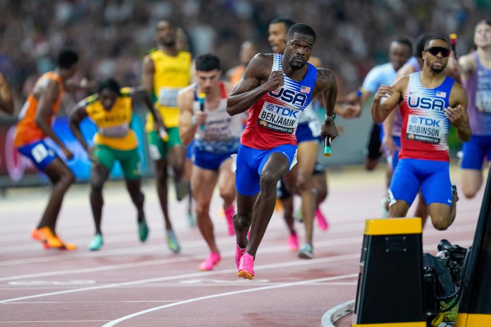 Rai Benjamin, of the United States runs in the final of the Men's 4x400-meters relay during the World Athletics Championships in Budapest, Hungary, Sunday, Aug. 27, 2023.(AP Photo/Ashley Landis)