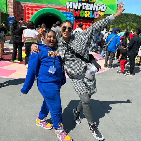 <p>Tamar Braxton Instagram</p> Tamar Braxton and her son Logan Vincent Herbert at Super Nintendo World at Universal Studios.