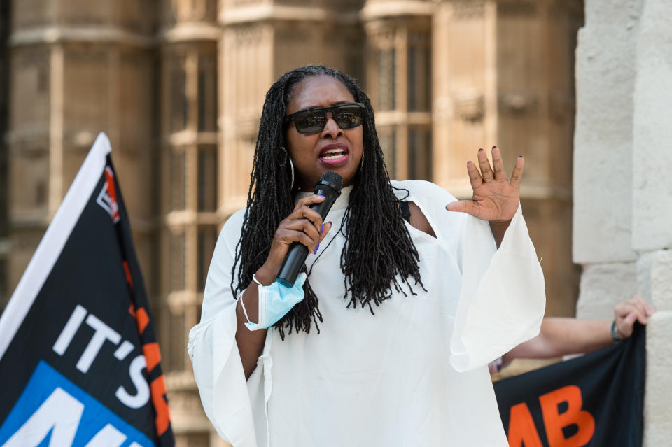 LONDON, UNITED KINGDOM - JULY 20, 2021: Labour Party MP Dawn Butler speaks during a protest outside the Houses of Parliament demanding 15% pay increase for health workers on July 20, 2021 in London, England. The Department for Health and Social Care has recommended that NHS staff in England should receive a 1% pay increase this year despite the unprecedented pressure experienced by the health workers during the coronavirus pandemic. (Photo credit should read Wiktor Szymanowicz/Future Publishing via Getty Images)