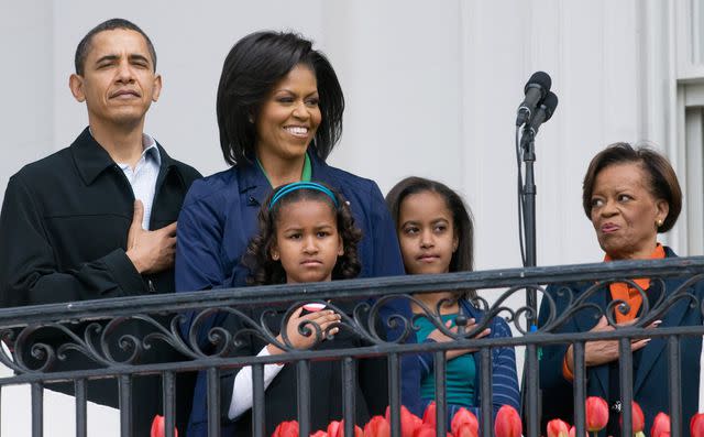 Barack, Michelle, Sasha and Malia Obama are joined by Marian Robinson at a 2009 White House event