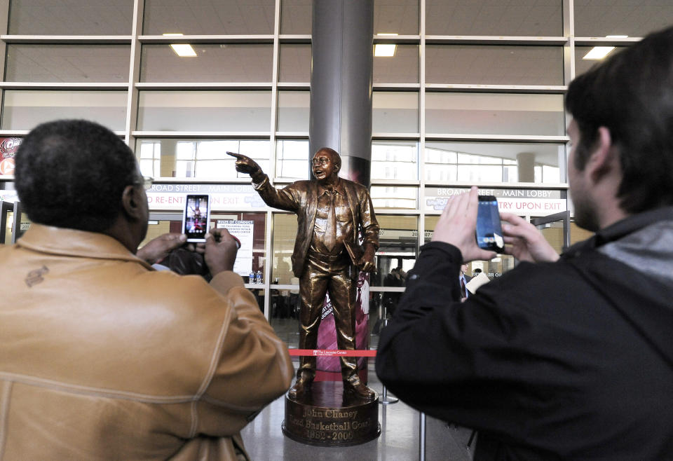 FILE - A statue of former Temple coach John Chaney is unveiled before the start of an NCAA college basketball game against Villanova in Philadelphia, in this Saturday, Feb. 1, 2014, file photo. John Chaney, one of the nation’s leading Black coaches and a commanding figure during a Hall of Fame basketball career at Temple, has died. He was 89. His death was announced by the university Friday, Jan. 29, 2021.(AP Photo/Michael Perez, File)