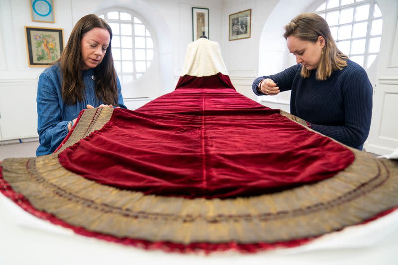 Work is carried out on Britain's King Charles's Robe of State