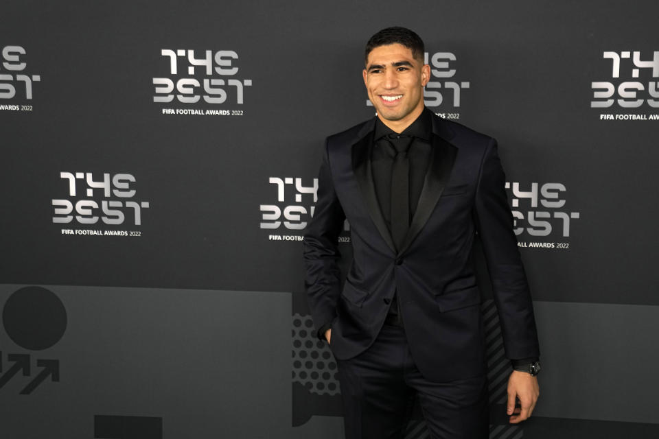 FILE - Moroccan player Achraf Hakimi poses on the green carpet before the ceremony of the Best FIFA Football Awards in Paris, France, Monday, Feb. 27, 2023. French prosecutors said Friday that Paris Saint-Germain defender and Morocco international star Achraf Hakimi has been indicted on rape charges. (AP Photo/Michel Euler, File)