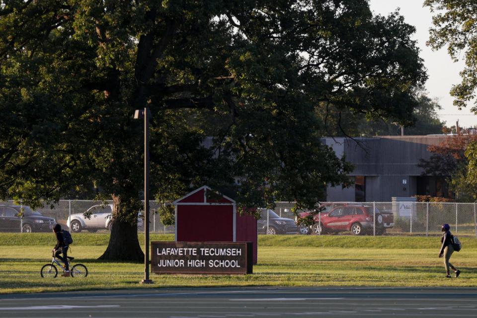 Students walk towards Lafayette Jefferson High School and Tecumseh Junior High School for the first day of school, Thursday, Aug. 20, 2020 in Lafayette.