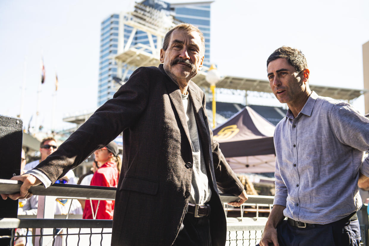 The moves of Padres team owner Peter Seidler (left) and top baseball executive A.J. Preller have stoked excitement about baseball in San Diego. (Photo by Matt Thomas/San Diego Padres/Getty Images)