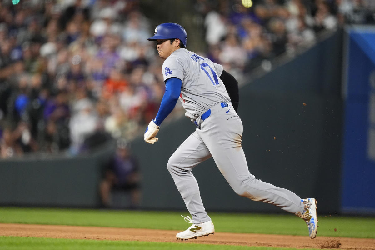 Ohtani is two hits ahead of leader Arraez in the Triple Crown contest as the Dodgers beat the Rockies 13-2