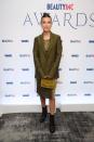 <p>The Stranger Things star paired an Helmut Lang blazer and dress with a Fendi handbag all in olive green at The WWD Beauty Awards.</p><p><a class="link " href="https://www.net-a-porter.com/gb/en/Shop/Designers/Fendi/Bags?image_view=product&pn=1&npp=60&dScroll=0" rel="nofollow noopener" target="_blank" data-ylk="slk:SHOP FENDI HANDBAGS NOW;elm:context_link;itc:0;sec:content-canvas">SHOP FENDI HANDBAGS NOW</a></p>