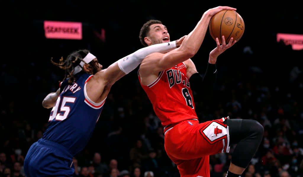 Zach LaVine (8) led Chicago Bulls to victory (Noah K. Murray/AP) (AP)