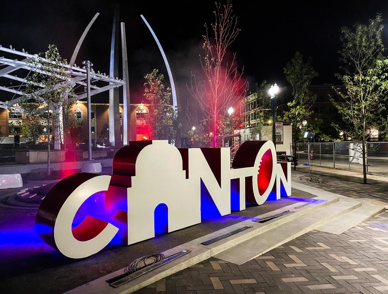 The Canton sign is shown at night at Centennial Plaza downtown.