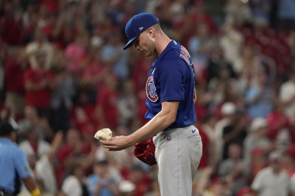 Chicago Cubs pitcher Sean Newcomb pauses after giving up a three-run home run to St. Louis Cardinals' Tommy Edman during the eighth inning of a baseball game Friday, Sept. 2, 2022, in St. Louis. (AP Photo/Jeff Roberson)