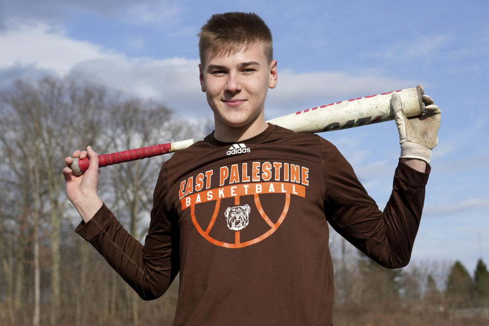 East Palestine High School senior Owen Elliott poses for a portrait, Monday, March 6, 2023, in East Palestine, Ohio. Athletes are navigating spring sports following the Feb. 3 Norfolk Southern freight train derailment. (AP Photo/Matt Freed)