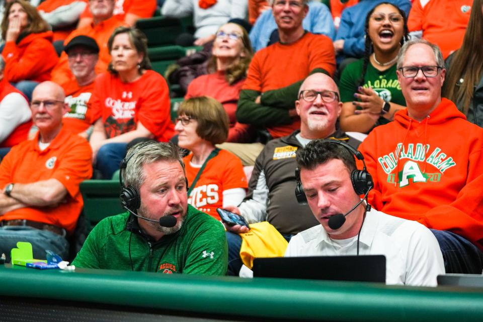 Brian Roth, left, and Adam Nigon call a Colorado State men's basketball game against Wyoming on Feb. 24 at Moby Arena in Fort Collins.