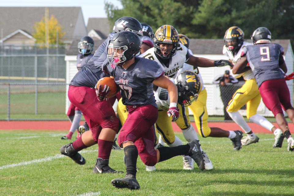 Hodgson's Jace Hawkins (17) gets by the defense for a touchdown in Newark's 36-35 win at Hodgson.