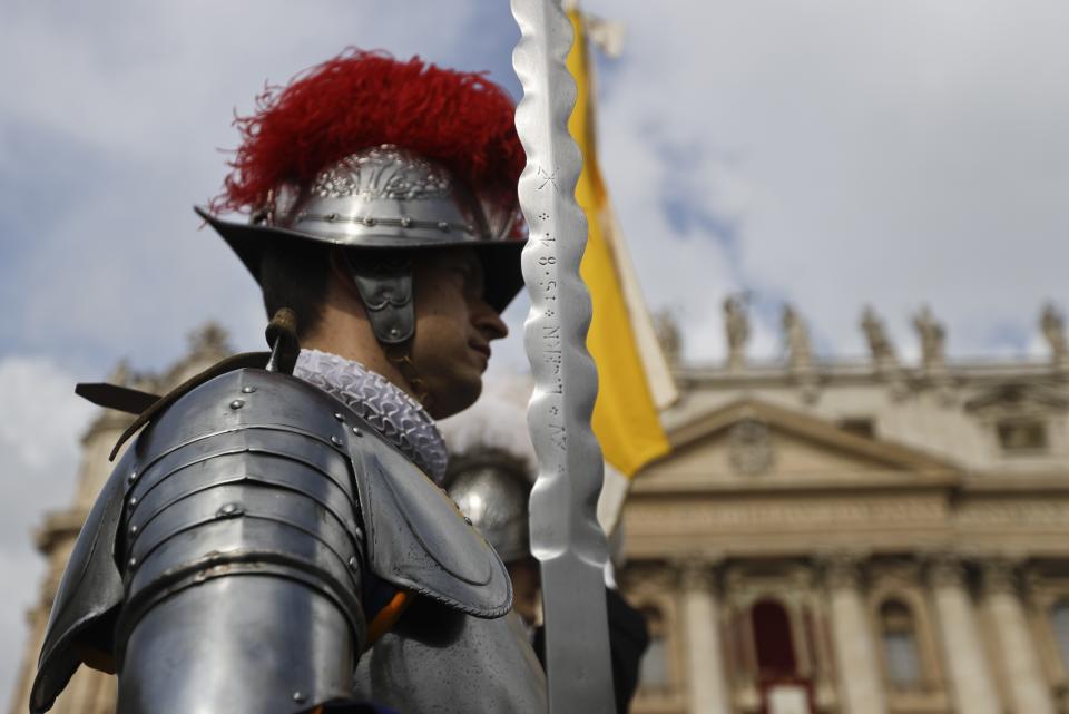 Swiss Guards stand in front of St. Peter's Basilica at the Vatican, Sunday, April 16, 2017 (AP Photo/Gregorio Borgia)