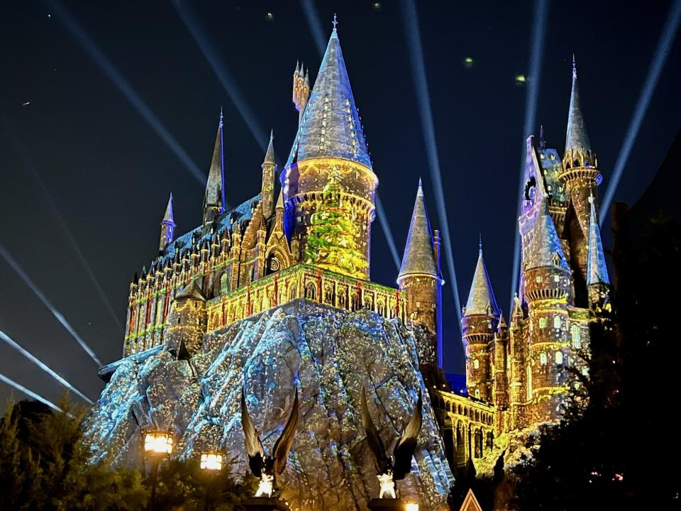 During The Magic of Christmas at Hogwarts Castle, holiday projections are shown against the iconic castle. (Photo: Terri Peters)