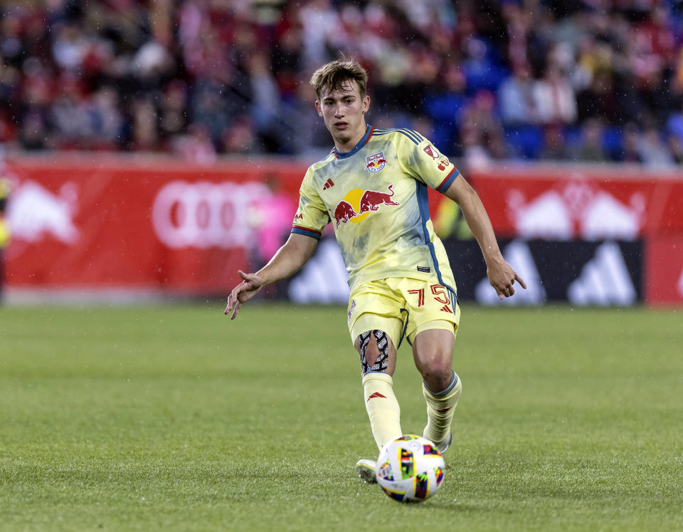 New York Red Bulls midfielder Daniel Edelman passes the ball during an MLS soccer match against the Vancouver Whitecaps, Saturday, April 27, 2024, in Harrison, N.J. (AP Photo/Stefan Jeremiah)