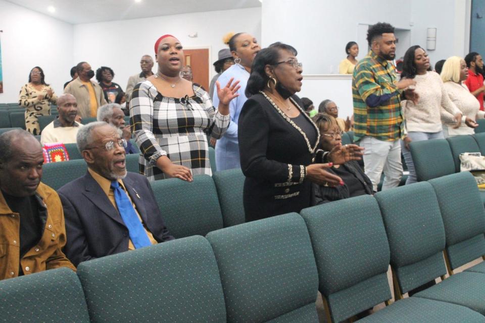 Parishioners praise the Lord during a joint Watch Night service at DaySpring Baptist Church with Emanuel Baptist Church on New year's Eve.
(Photo: Photo by Voleer Thomas/For The Guardian)