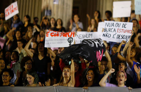 Demonstrators attend a protest against rape and violence against women in Rio de Janeiro, Brazil, May 27, 2016. REUTERS/Ricardo Moraes