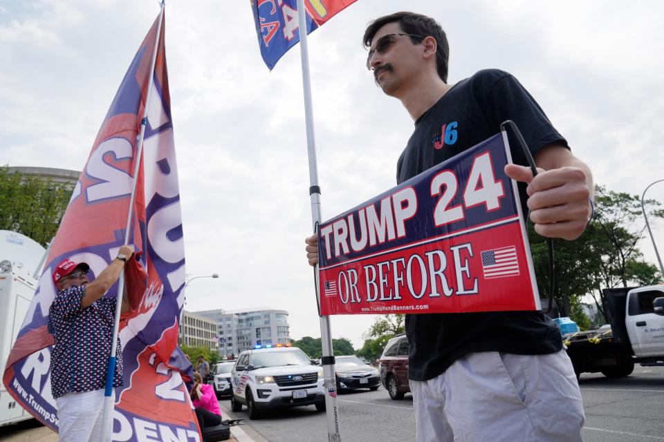 Daniel Demoura, 32, of Boston, a supporter of former President Donald Trump, is seen outside the E. Barrett Prettyman United States Courthouse on Aug 3, 2023. Former President Donald Trump is set to be arraigned on four charges related to the 2020 election. Federal prosecutors are accusing Trump of undermining American democracy by organizing a wide-ranging conspiracy to steal the 2020 election that prosecutors allege fueled a brazen and historic insurrection at the U.S. Capitol.