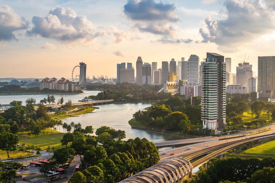 A high view point of Singapore buildings in central downtown district skyline, Singapore flyer and express highway