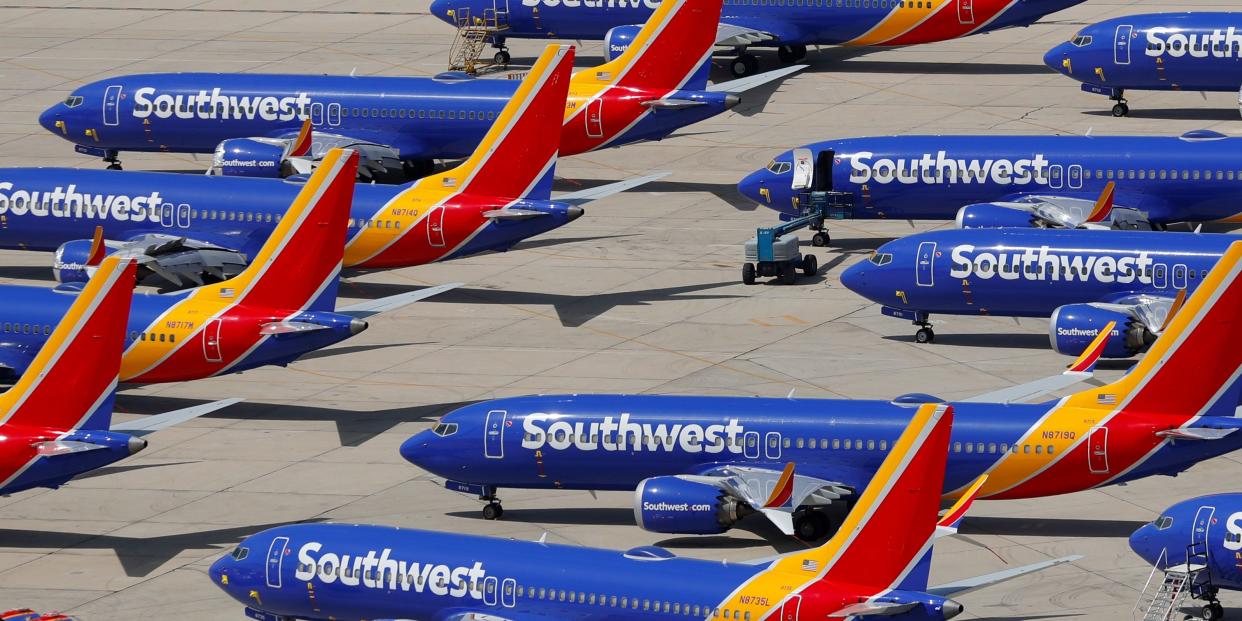 FILE PHOTO: A number of grounded Southwest Airlines Boeing 737 MAX 8 aircraft are shown parked at Victorville Airport in Victorville, California, U.S., March 26, 2019.  REUTERS/Mike Blake/File Photo