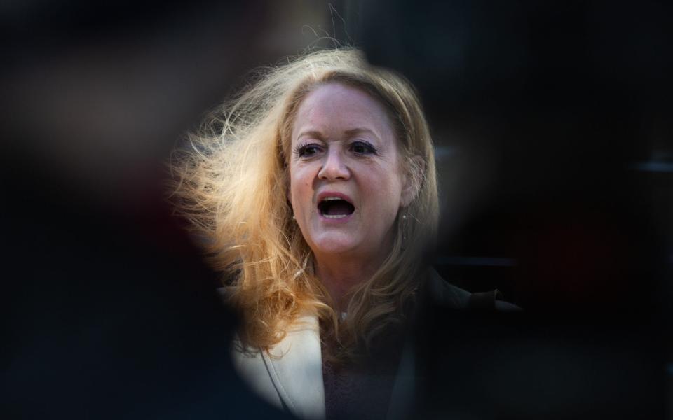 Barbara Bouchey, a former member of the NXIVM group, speaks to members of the media outside federal court in the Brooklyn  - Bloomberg