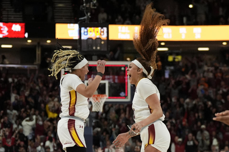 South Carolina center Kamilla Cardoso, right, celebrates after scoring the game winning basket with guard Te-Hina Paopao against Tennessee during the second half of an NCAA college basketball game at the Southeastern Conference women's tournament Saturday, March 9, 2024, in Greenville, S.C. (AP Photo/Chris Carlson)