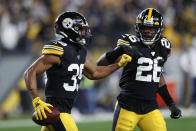 Pittsburgh Steelers free safety Minkah Fitzpatrick, left, celebrates with Mark Barron (26) after Fitzpatricks touchdown following the recovery of a fumble by Los Angeles Rams quarterback Jared Goff during the first half of an NFL football game in Pittsburgh, Sunday, Nov. 10, 2019. (AP Photo/Keith Srakocic)