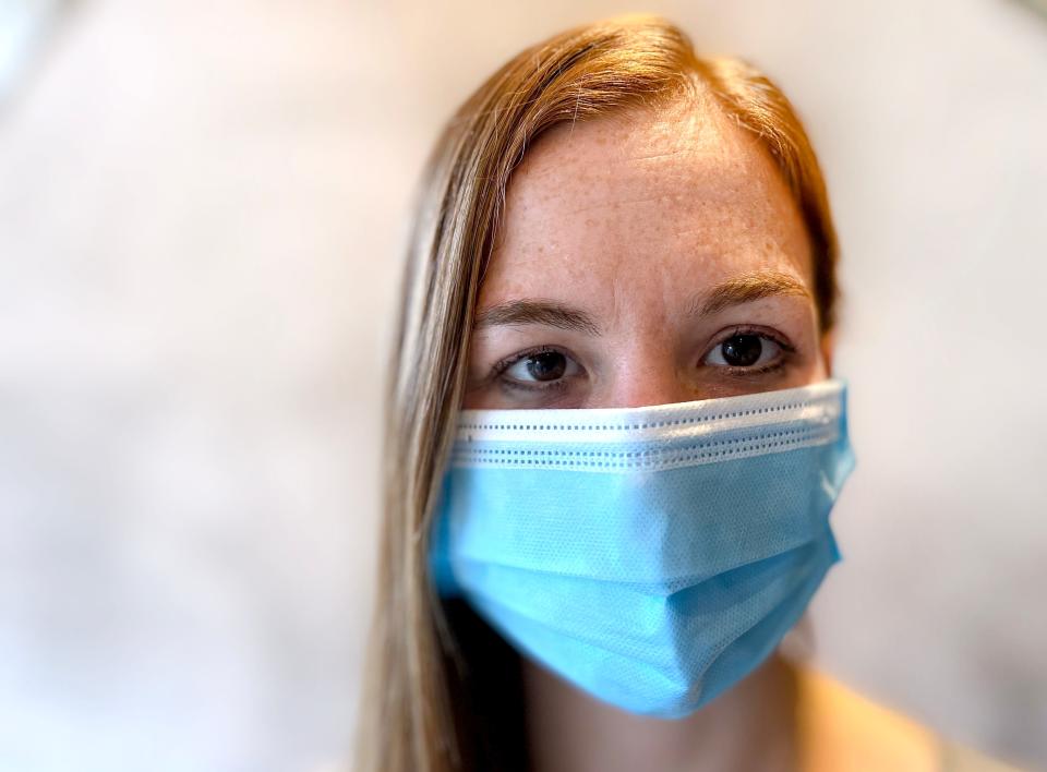 From behind her mask, Medical College of Wisconsin resident Kim Tyler pondered how to answer patients who asked her, "Am I going to die?"