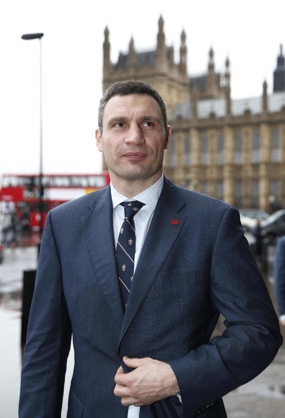 Vitali Klitschko, leader of Ukraine's UDAR party, poses for the photographers after meetings with British parliamentarians in central London, Wednesday, March 26, 2014. (AP Photo/Lefteris Pitarakis)