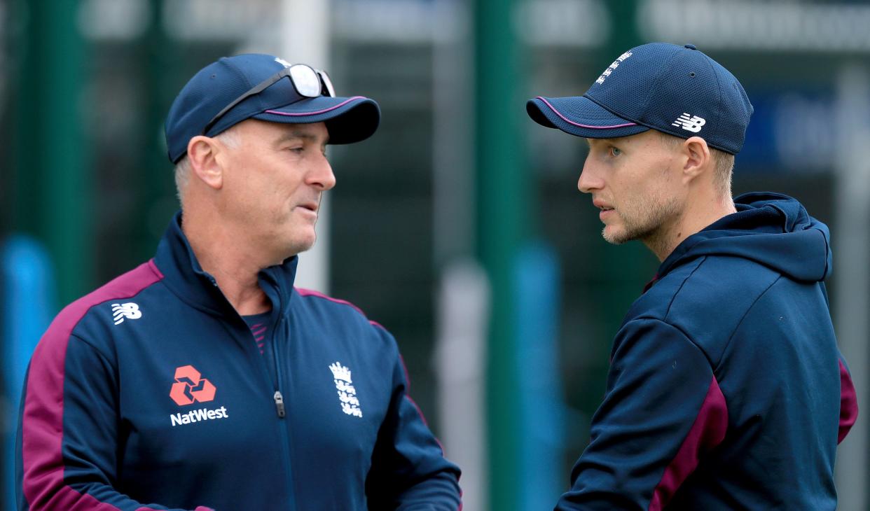 joe Root in conversation with coach Graham Thorpe (PA)