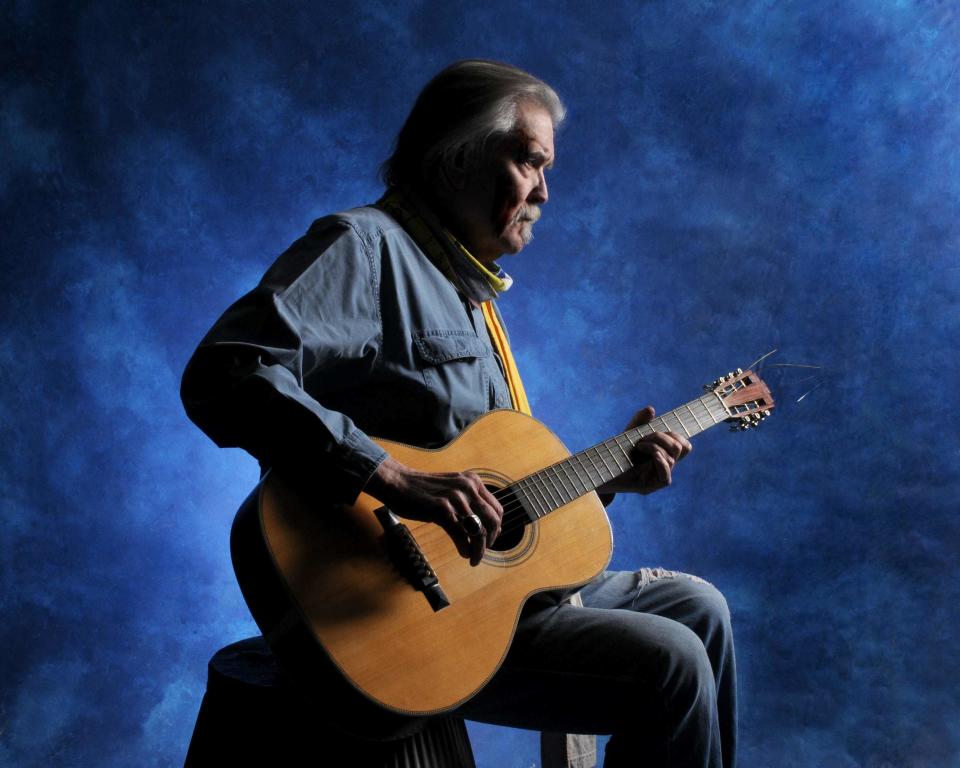 This undated publicity image released by Dualtone Records shows musician Guy Clark. Clark, the West Texas writer who penned such hits as “LA Freeway,” and “Desperados Waiting for a Train,” has physically slowed down at the age of 71, but his new album “My Favorite Picture of You,” proves his skills as a country music poet are still sharp. (AP Photo/Dualtone)