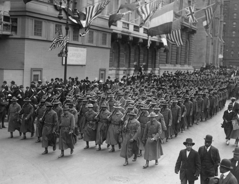 The all black 15th regiment parading up Fifth Avenue, New York City, en route to an Army camp in New York State in 1916.