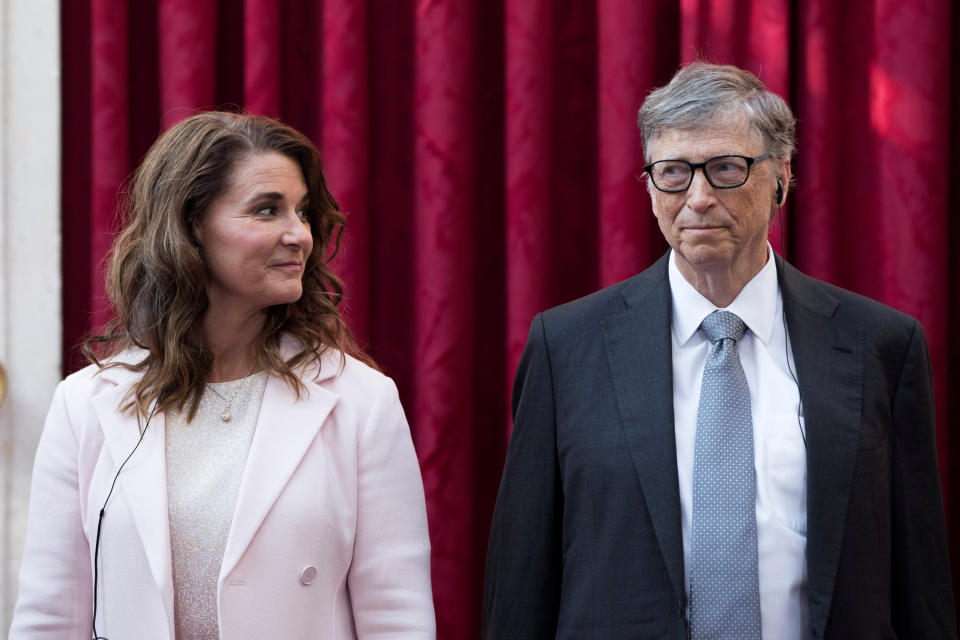 Image: Philanthropist and co-founder of Microsoft, Bill Gates and his wife Melinda listen to the speech by French President Francois Hollande, prior to being awarded Commanders of the Legion of Honor at the Elysee Palace in Paris (Kamil Zihnioglu / Pool via Reuters)