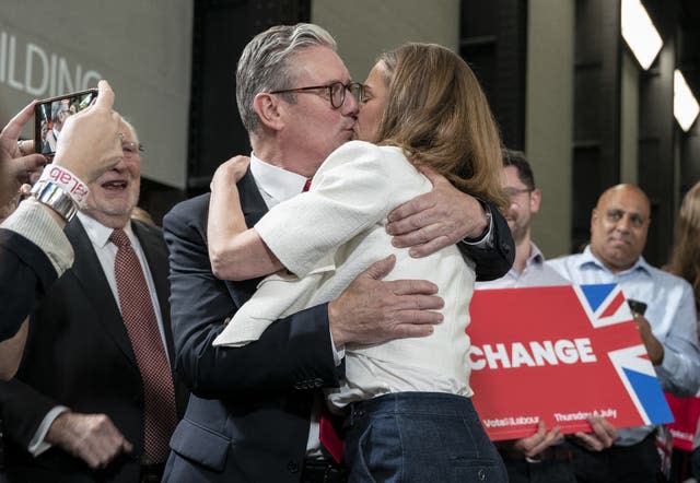Sir Keir Starmer embraces his wife Victoria at Tate Modern