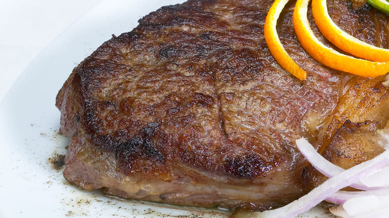 Orange peel on cooked beef