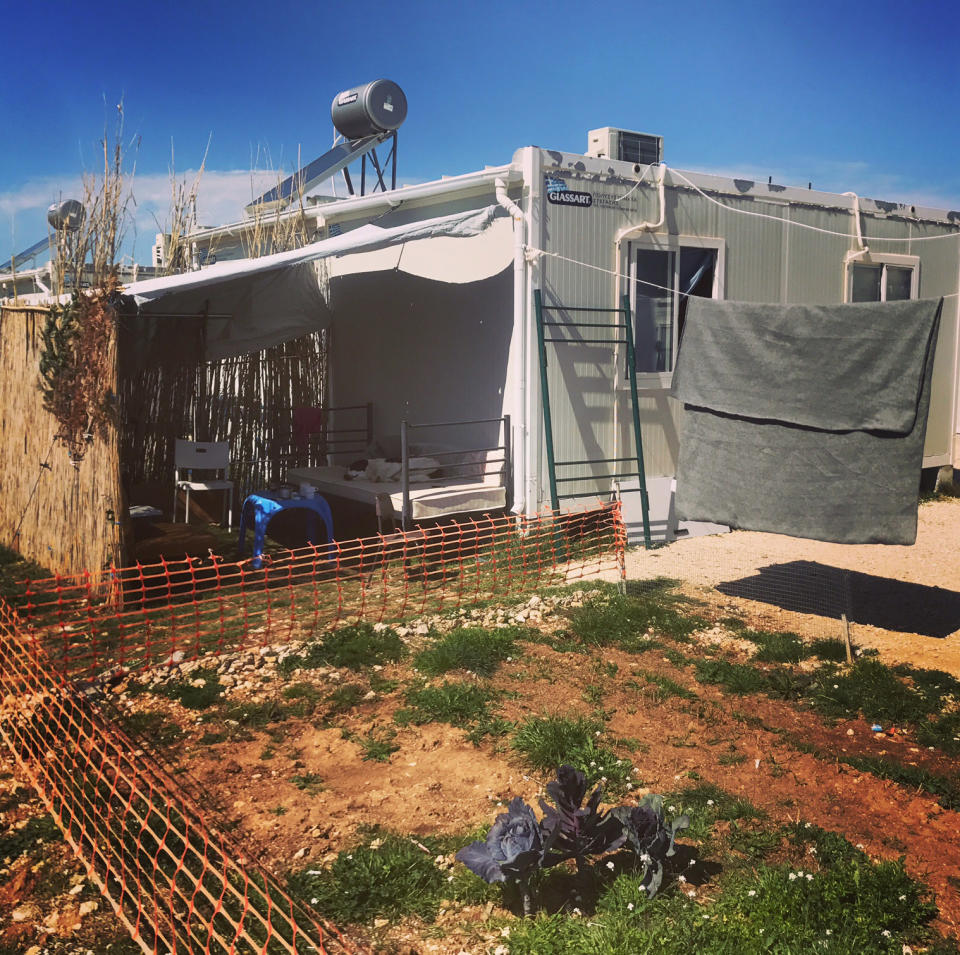 A makeshift patio on a shipping crate at Katsikas Camp in Greece in 2018. | Courtesy of Dina Nayeri