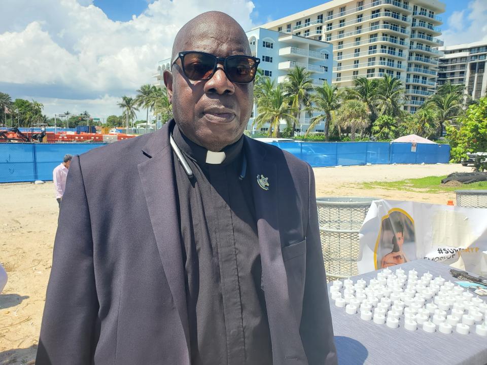Rev. Bill Minson, of the United States Secret Service, attends a press conference with survivors' families in Surfside, Florida. Sept. 23, 2021.