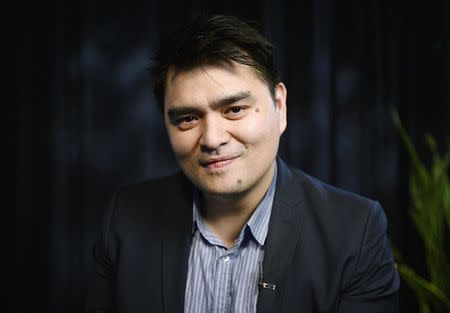 Journalist and director of film "Documented", Jose Antonio Vargas, poses for a photograph in Los Angeles, Californa June 18, 2014. REUTERS/Kevork Djansezian