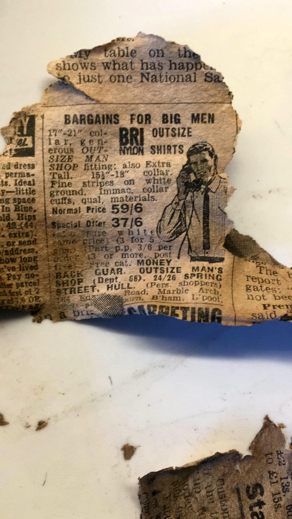 A piece from a newspaper found inside the 120-year-old tunnel  (SWNS)