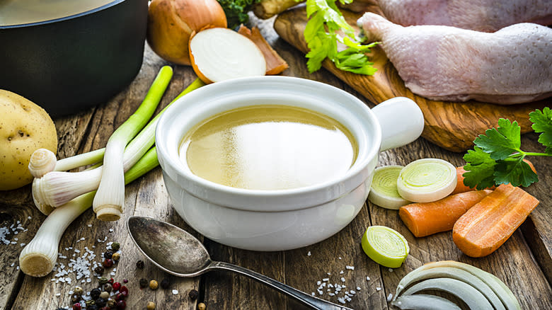 white bowl of chicken stock